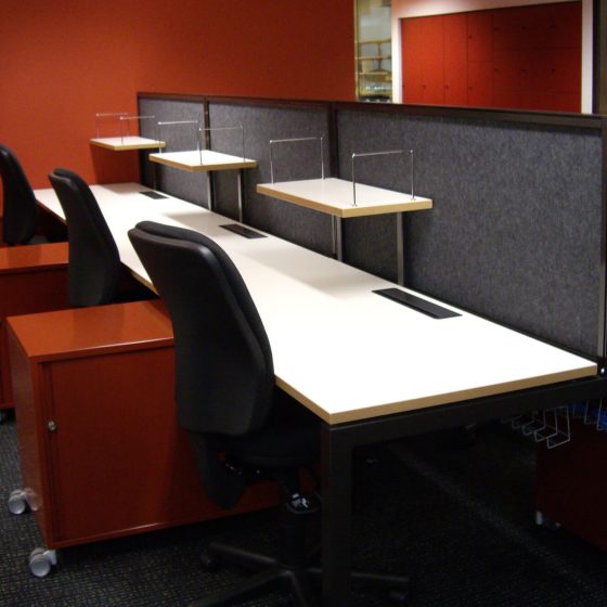 Workstation fitout: Monash Student Work space with ero Fixed height workstations with screens and mobile caddies