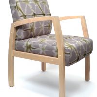 Commercial Furniture Products, Bella Chair healthcare aged care timber frame with arms Custom upholstery Medium back guest chair front angle