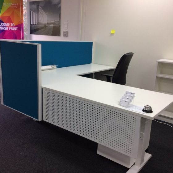 Modesty panel perforated dots reception desk
