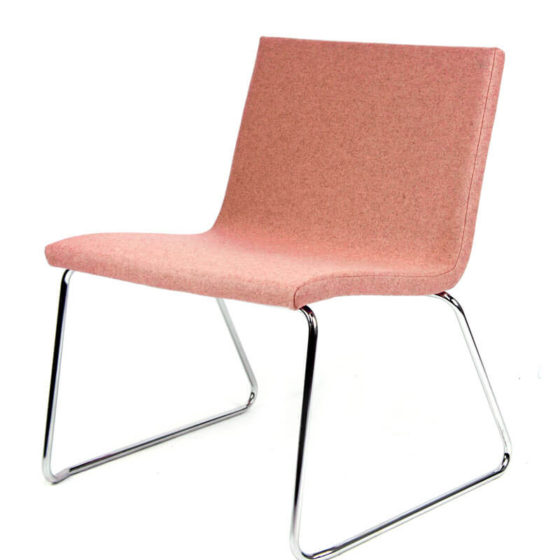 Zig lounge chair with upholstered shell on sled base.