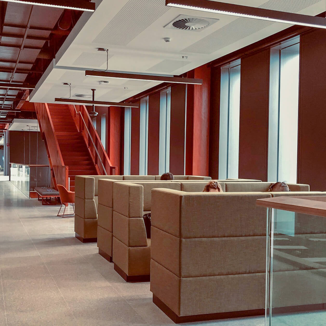 Custom high back modular lounges in collaborative hubs
